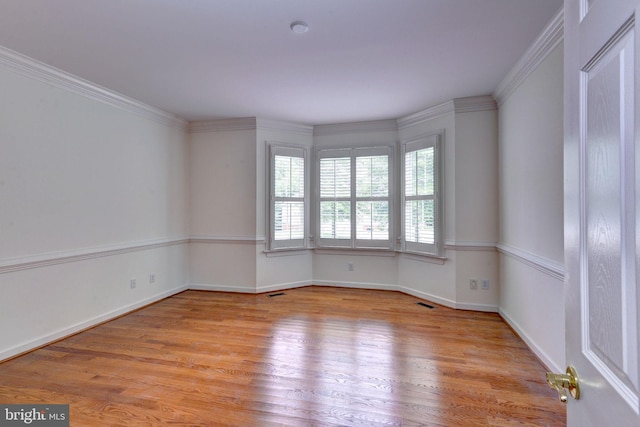 3609 Bradinton, Williamsburg, VA 23188 - spare room with light wood finished floors, baseboards, and crown molding