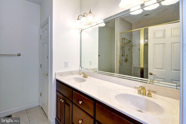3609 Bradinton, Williamsburg, VA 23188 - bathroom with tile patterned flooring, a shower stall, and double vanity
