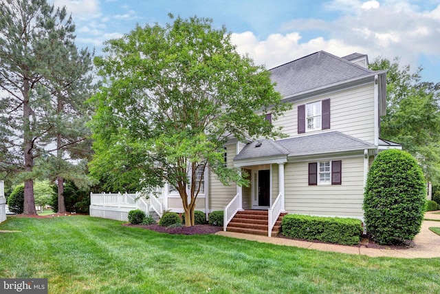 3609 Bradinton, Williamsburg, VA 23188 - view of front of home featuring a front lawn and roof with shingles