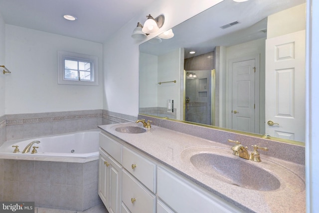 3609 Bradinton, Williamsburg, VA 23188 - full bath featuring a whirlpool tub, a stall shower, double vanity, and recessed lighting