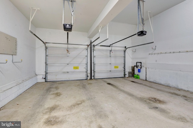 3609 Bradinton, Williamsburg, VA 23188 - garage featuring a garage door opener