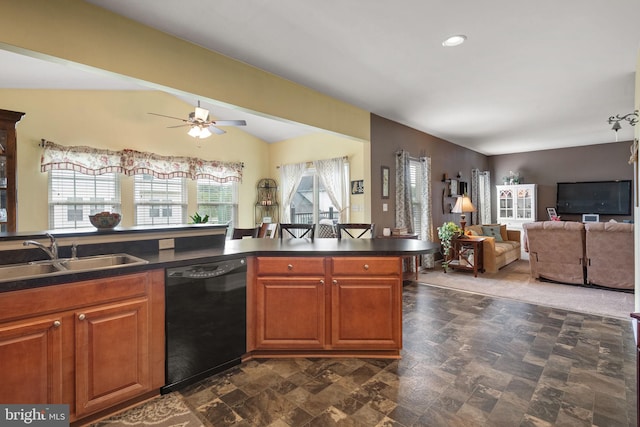 17365 Norland Way, Shrewsbury, PA 17361 - kitchen with dishwasher, a sink, open floor plan, dark countertops, and lofted ceiling