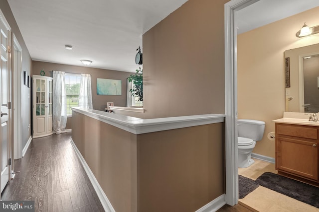 17365 Norland Way, Shrewsbury, PA 17361 - bathroom with vanity, toilet, wood finished floors, and baseboards