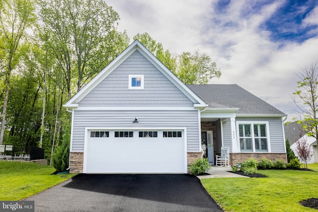 802 Horseshoe Falls Dr, Newark, DE 19702 - craftsman house featuring stone siding, driveway, and a front lawn