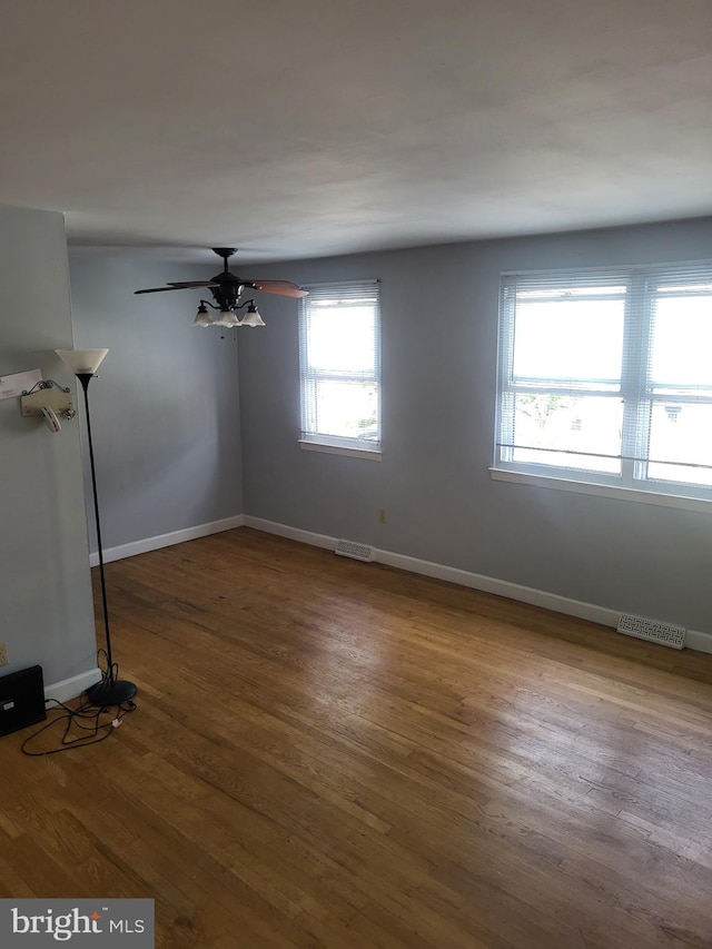 4410 Falls Bridge Dr Unit H, Baltimore, MD 21211 - unfurnished room with wood finished floors, baseboards, and ceiling fan