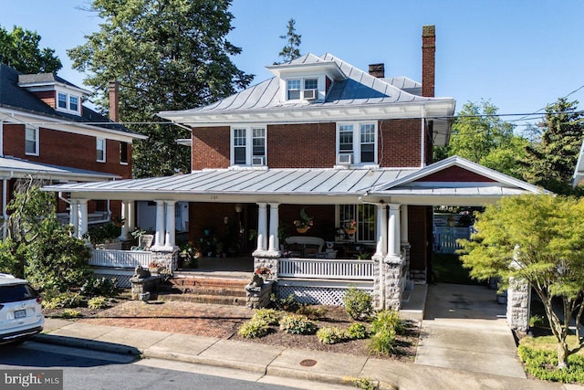 289 Newman Ave, Harrisonburg, VA 22801 - traditional style home featuring a standing seam roof, covered porch, metal roof, a chimney, and brick siding