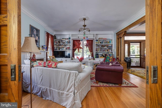 289 Newman Ave, Harrisonburg, VA 22801 - living area with crown molding, wood finished floors, and a chandelier