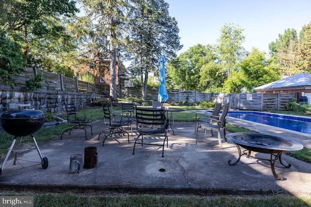 289 Newman Ave, Harrisonburg, VA 22801 - fenced backyard with a patio area and a grill