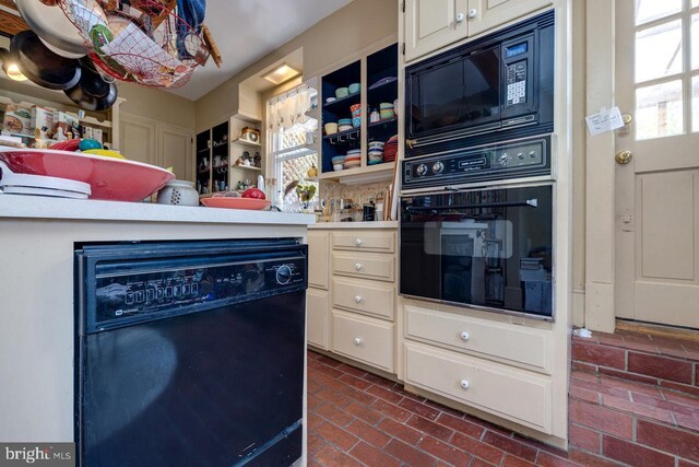 289 Newman Ave, Harrisonburg, VA 22801 - kitchen featuring black appliances, light countertops, brick floors, and open shelves