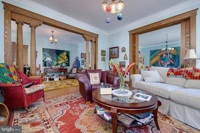 289 Newman Ave, Harrisonburg, VA 22801 - living room with a chandelier, wood finished floors, ornamental molding, and ornate columns