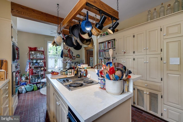 289 Newman Ave, Harrisonburg, VA 22801 - kitchen with brick floors, light countertops, stainless steel appliances, a kitchen island, and beamed ceiling
