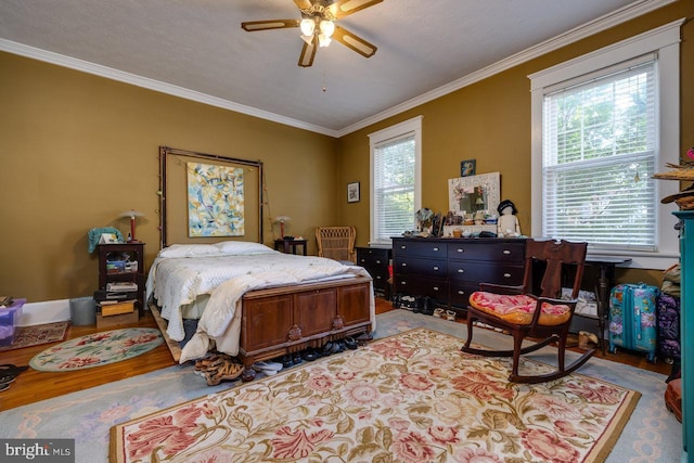 289 Newman Ave, Harrisonburg, VA 22801 - bedroom with crown molding, wood finished floors, and a ceiling fan