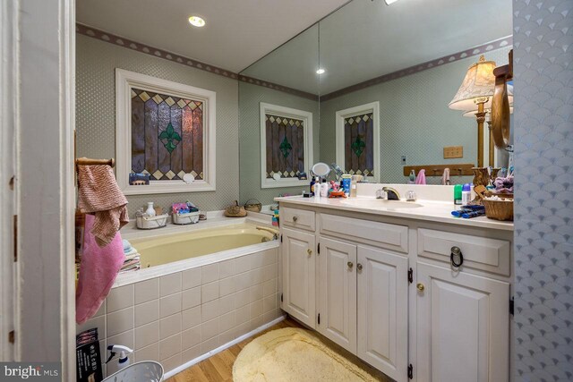 289 Newman Ave, Harrisonburg, VA 22801 - full bath featuring vanity, a bath, wood finished floors, and recessed lighting