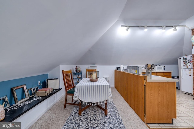 289 Newman Ave, Harrisonburg, VA 22801 - dining area with track lighting and vaulted ceiling