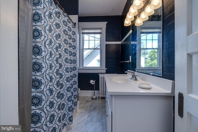 289 Newman Ave, Harrisonburg, VA 22801 - bathroom with vanity, radiator, marble look tile flooring, and a shower with curtain