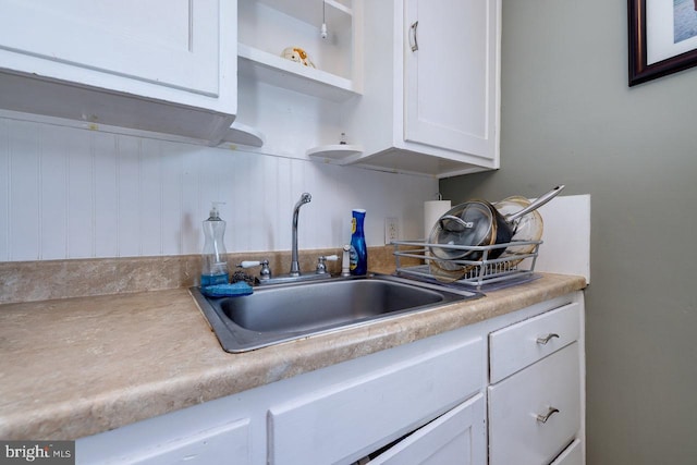 289 Newman Ave, Harrisonburg, VA 22801 - kitchen with white cabinets, a sink, open shelves, and light countertops