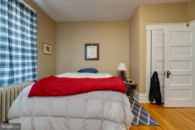 289 Newman Ave, Harrisonburg, VA 22801 - bedroom with radiator and wood finished floors