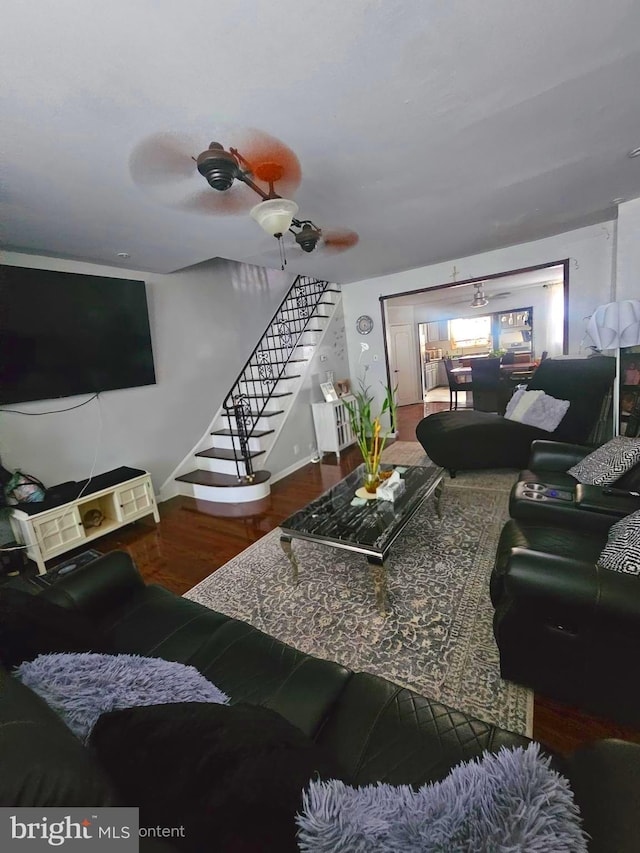 3908 Bennington St, Philadelphia, PA 19124 - living room featuring stairway, wood finished floors, and baseboards