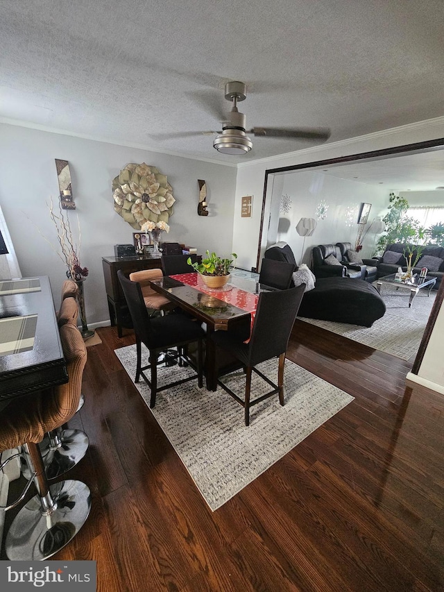 3908 Bennington St, Philadelphia, PA 19124 - dining space featuring wood finished floors, a textured ceiling, and a ceiling fan