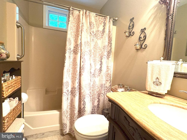 full bathroom with vanity, toilet, and shower / bath combo