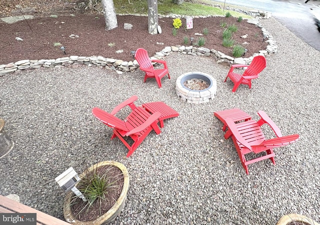 view of property's community featuring a fire pit