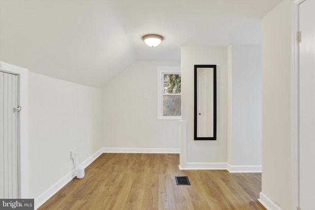 322 S Progress Ave, Harrisburg, PA 17109 - additional living space featuring light wood-type flooring, vaulted ceiling, and baseboards