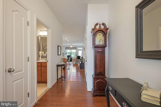 42 Cresthaven Ln, Dover, DE 19901 - corridor with dark wood-type flooring and recessed lighting