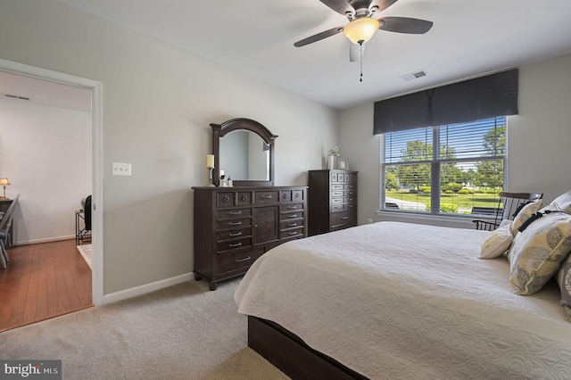 42 Cresthaven Ln, Dover, DE 19901 - bedroom with baseboards, ceiling fan, and carpet