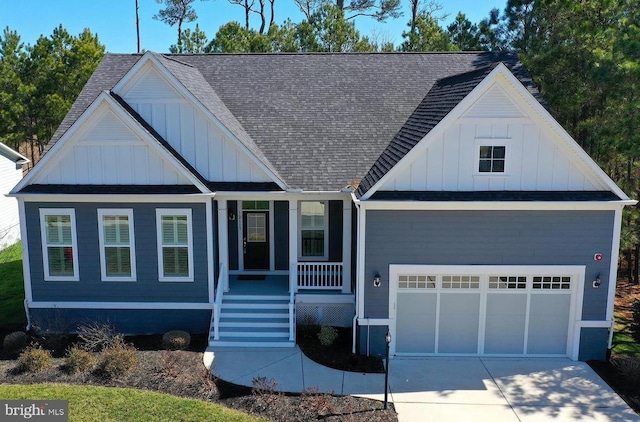 123 Windjammer Rd, Ocean Pines, MD 21811 - view of front of property featuring a porch, board and batten siding, roof with shingles, and an attached garage
