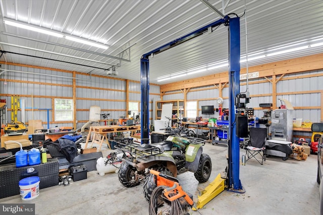 16010 Four Points Bridge Rd, Emmitsburg, MD 21727 - garage with a workshop area and metal wall