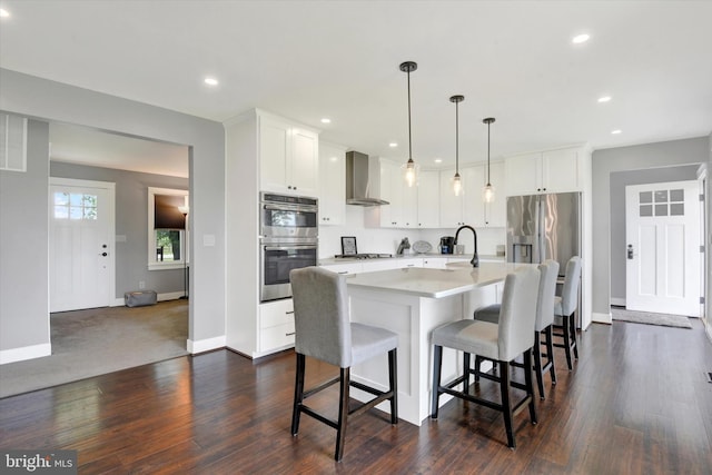 16010 Four Points Bridge Rd, Emmitsburg, MD 21727 - kitchen with wall chimney exhaust hood, appliances with stainless steel finishes, light countertops, a sink, and dark wood finished floors