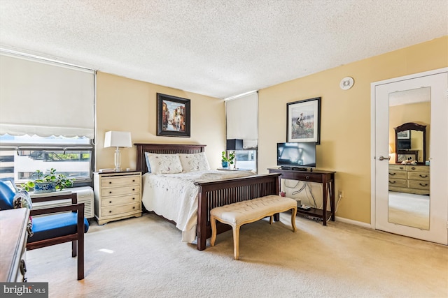 205 E Joppa Rd Unit 403, Baltimore, MD 21286 - bedroom featuring light carpet and a textured ceiling