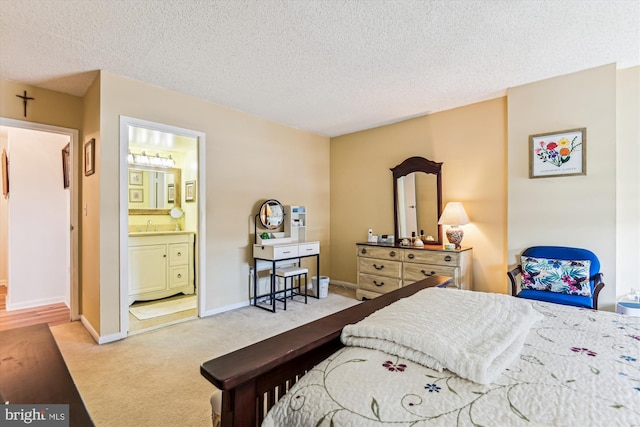 205 E Joppa Rd Unit 403, Baltimore, MD 21286 - carpeted bedroom with a textured ceiling, connected bathroom, and baseboards