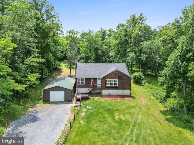 979 John Brown Farm Rd, Harpers Ferry, WV 25425 - chalet / cabin with an outbuilding, a front yard, gravel driveway, and a detached garage
