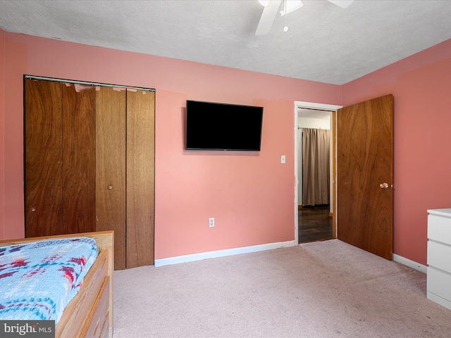 979 John Brown Farm Rd, Harpers Ferry, WV 25425 - carpeted bedroom with baseboards, a closet, and ceiling fan