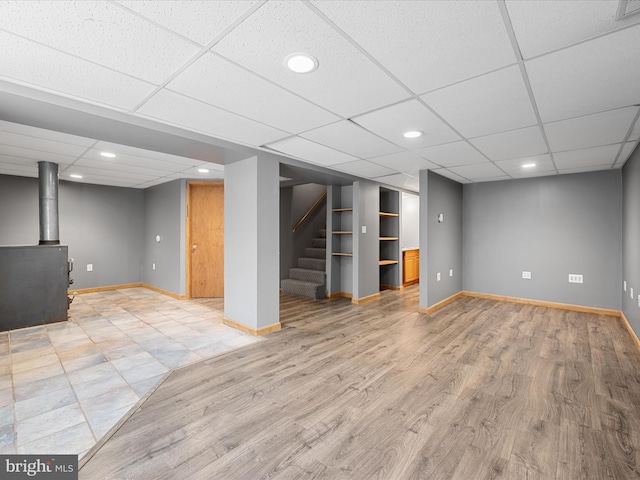 979 John Brown Farm Rd, Harpers Ferry, WV 25425 - finished below grade area with baseboards, light wood-style flooring, stairway, built in shelves, and recessed lighting
