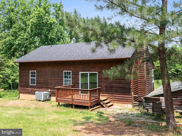 979 John Brown Farm Rd, Harpers Ferry, WV 25425 - back of house with a shingled roof, central air condition unit, a deck, and a yard