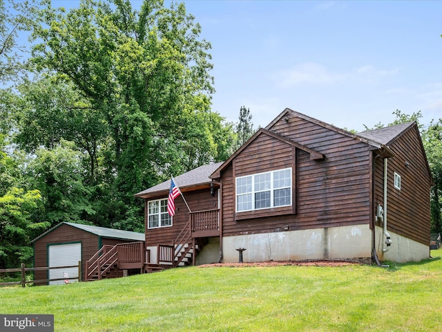 979 John Brown Farm Rd, Harpers Ferry, WV 25425 - view of front facade featuring a front lawn, an outbuilding, a garage, and stairway