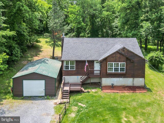 979 John Brown Farm Rd, Harpers Ferry, WV 25425 - rustic home featuring an outdoor structure, a shingled roof, a front lawn, and driveway