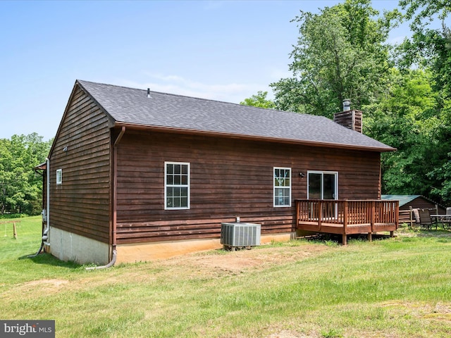 979 John Brown Farm Rd, Harpers Ferry, WV 25425 - rear view of property with a chimney, cooling unit, a deck, a yard, and a shingled roof