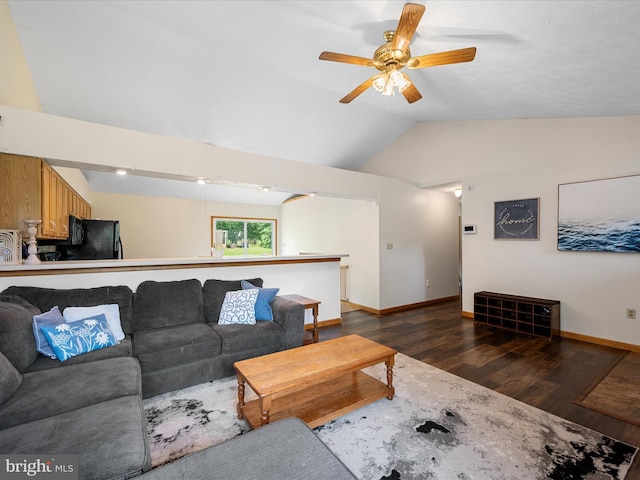 979 John Brown Farm Rd, Harpers Ferry, WV 25425 - living area featuring vaulted ceiling, dark wood-style flooring, ceiling fan, and baseboards