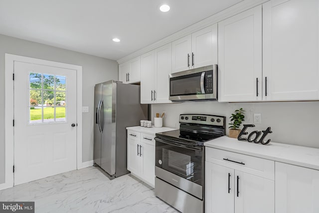 2017 Fairlane Rd, Bel Air, MD 21015 - kitchen with appliances with stainless steel finishes, recessed lighting, light marble finish floors, and white cabinetry
