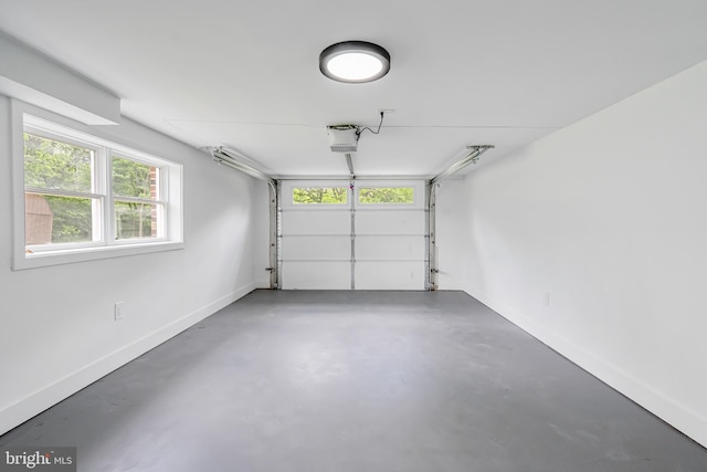 2017 Fairlane Rd, Bel Air, MD 21015 - garage featuring baseboards and a garage door opener