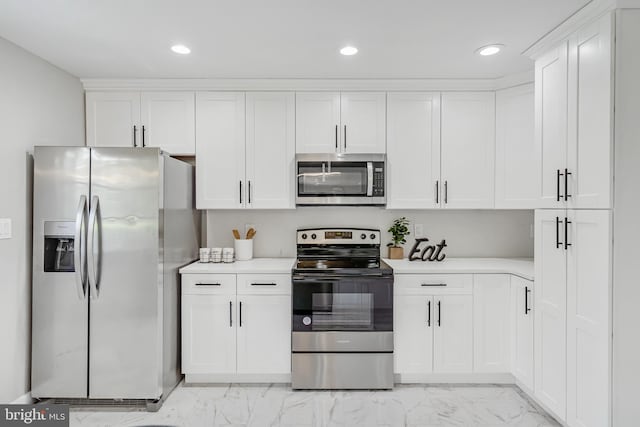 2017 Fairlane Rd, Bel Air, MD 21015 - kitchen with appliances with stainless steel finishes, light marble finish floors, light countertops, and recessed lighting