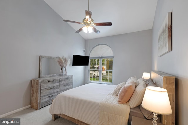 8822 Tanglewood Ln, Manassas, VA 20110 - bedroom with light carpet, lofted ceiling, baseboards, and a ceiling fan