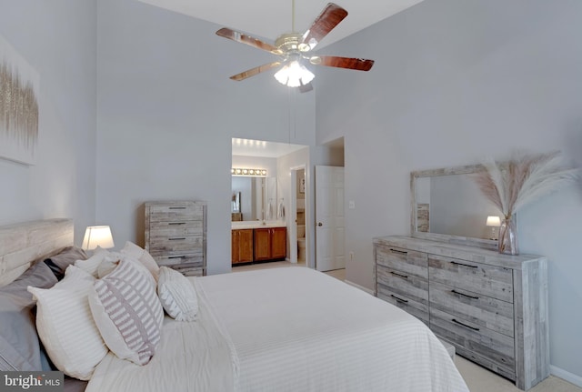 8822 Tanglewood Ln, Manassas, VA 20110 - bedroom featuring a high ceiling, ensuite bathroom, baseboards, and a ceiling fan