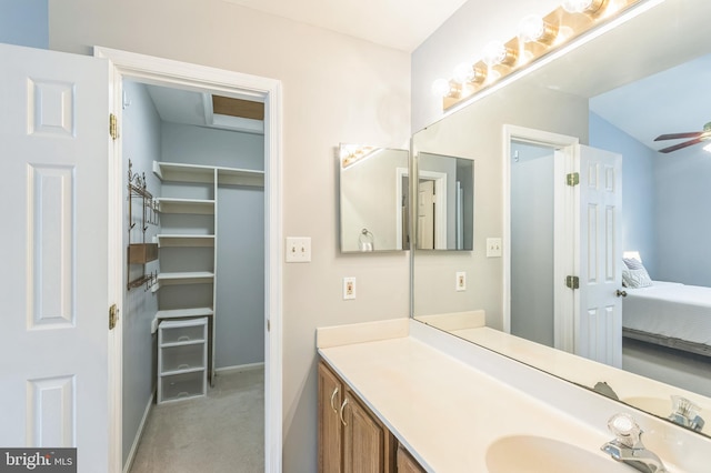 8822 Tanglewood Ln, Manassas, VA 20110 - bathroom featuring ensuite bath, vanity, a ceiling fan, and baseboards