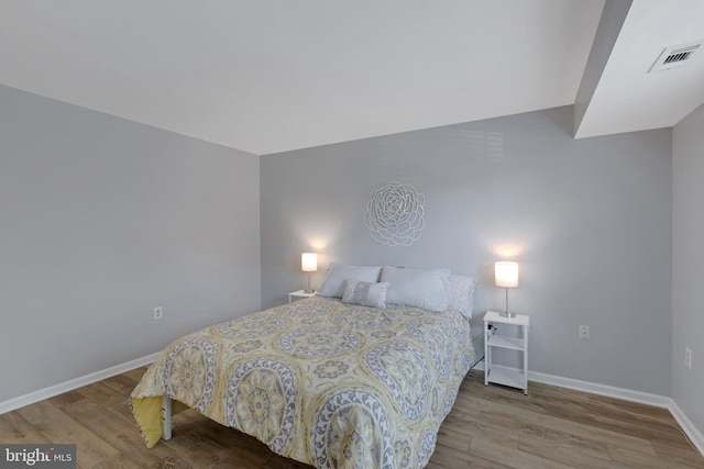 8822 Tanglewood Ln, Manassas, VA 20110 - bedroom with wood finished floors and baseboards