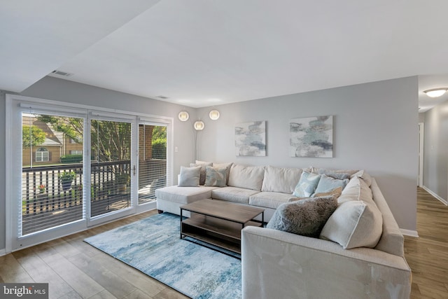 8822 Tanglewood Ln, Manassas, VA 20110 - living room featuring wood finished floors and baseboards