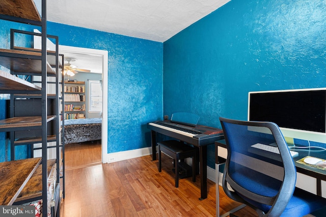 1409 S Clarion St, Philadelphia, PA 19147 - office area featuring wood finished floors, baseboards, a textured wall, ceiling fan, and a textured ceiling